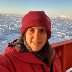 Carmen Cobo Llovo smiling in front of a field of ice