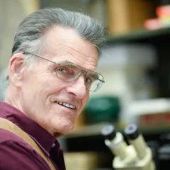 Doctor Alfred L. Gardner, USGS Curator Emeritus, in his office