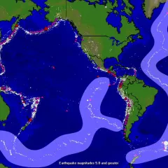 Colorful world map showing areas of seismic activity