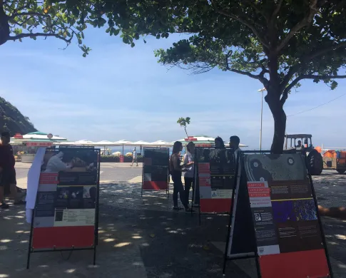 for posters on sandwich boards on a beach