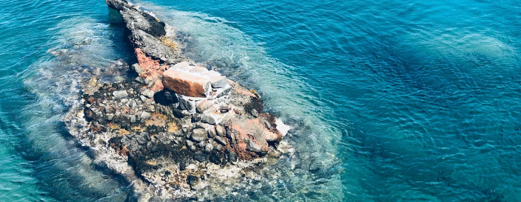 Rocky island in a blue sea