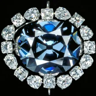 blue diamond surrounded by smaller diamonds 