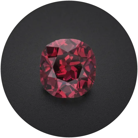 Red diamond gem on a black background	