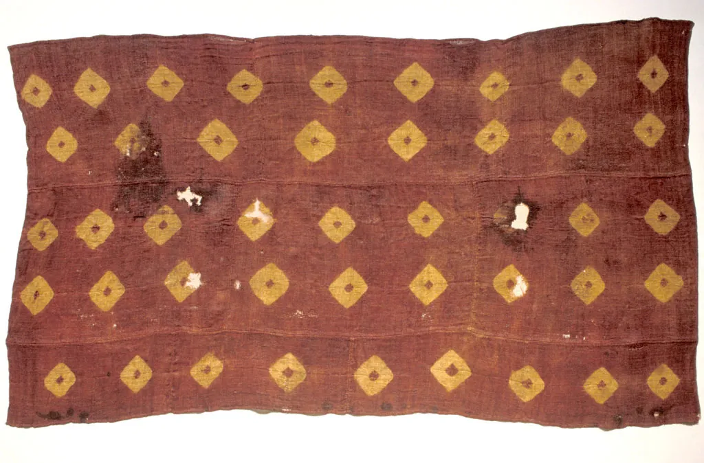 Raffia textile. Tie dye designs were added to this finely woven cloth.