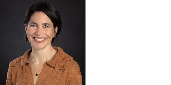 A portrait of Elizabeth Cottrell, a light-skinned woman with short black hair, who is wearing a caramel-brown sweater and a necklace with a black pendant.