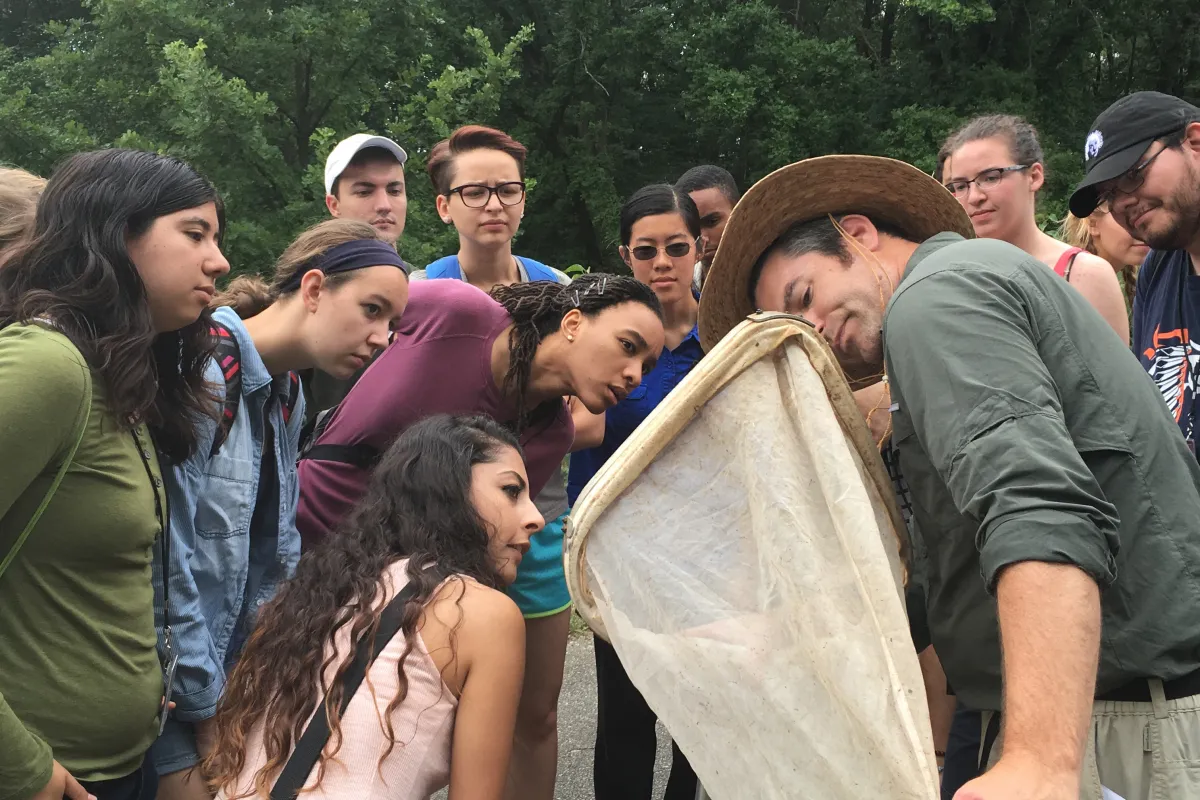 Entomologist Matt Buffington reveals his catch to NHRE class of 2016